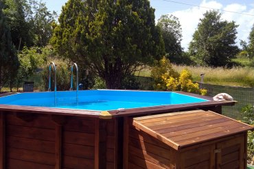 Piscina in legno fuori terra esagonale Jardin 434, con locale tecnico in legno opzionale. Ideale per il tuo giardino, facile da installare e mantenere.