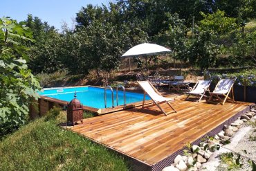 Piscina in legno seminterrata rettangolare JARDIN CARRE 6x4 è l'ideale per chi cerca relax e divertimento in giardino.